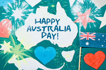 Celebrate Australia-Day holiday on January 26 with a Happy Australia Day message greeting written card across Australian maps and flag hanging pegs on blue background.