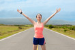 © PR Image Factory - beautiful cheerful woman jogger standing on road