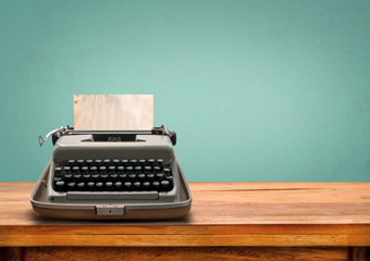 Vintage typewriter with old paper. retro machine technology