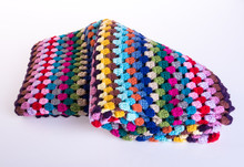 Crochet Or Crochet Blanket On A Background.