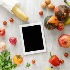 Poster - Top view raw food tablet on wooden background. Healthy food