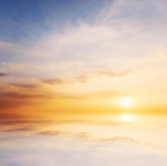 Wall Mural - Background sky during sunset and water reflections.