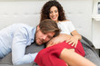 © Minerva Studio - Husband listening to his baby in mom's belly
