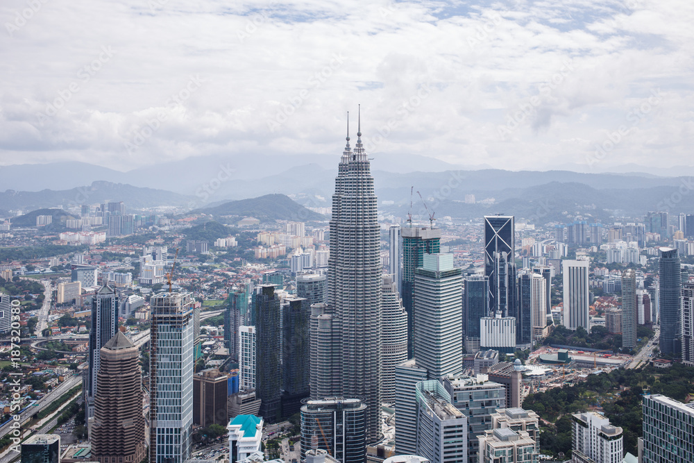 City center with Petronas twin towers, Kuala Lumpur skyline - obrazy, fototapety, plakaty 