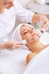 Wall Mural - woman on facial skincare procedure. hardware cosmetology.