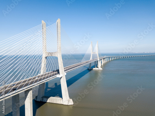 Cuadros en Lienzo Aerial View Of Vasco da Gama Bridge And High Car Traffic In Lisbon City Of Portu