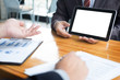 © snowing12 - businessman presenting something at the seminar using tablet at the office, Audit concept at working