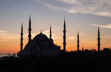 Silhouette Of Blue Mosque Sultan Ahmed On Sunset Background In Istanbul, Turkey