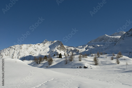 High Mountain Landscape On A Sunny Day And Blue Skies After A Snowfall In The Background The Glacier Of Mount Breithorn Simplon Pass Alps Winter Cold Valais Switzerland Buy This Stock