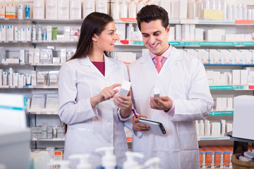 Wall Mural - pharmacists  posing in drugstore