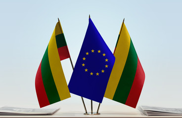 Two flags of Lithuania and European Union flag between