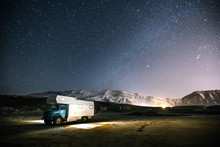 Camping Truck In Snowcovered Mountain Landscape At Night, Turkey