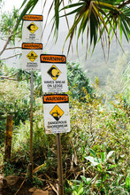 Warning Signs On Trail To Beach