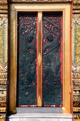 Thai art on Entrance door of Church at Wat Benchamabophit, the Marble temple Bangkok.