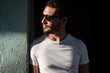 © Branislav Jovanovic/Stocksy - Portrait Of Handsome Man Wearing Sunglasses