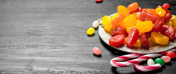 Sticker - Different baby sweets in bowls.