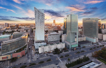 Wall Mural - Warsaw city with modern skyscraper at sunset, Poland