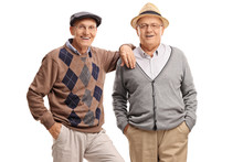 Two Elderly Men Looking At The Camera And Smiling
