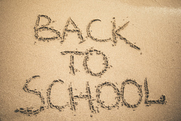 Wall Mural - Back to School text written on sand