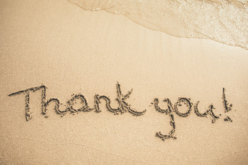 Wall Mural - Thank you text written on the sand
