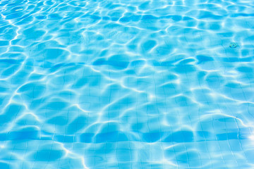  Water abstract background, Swimming pool rippled.Under water tile of swimming pool floor.