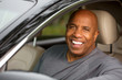 © digitalskillet1 - African American man driving.