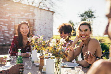 Young people partying at garden restaurant