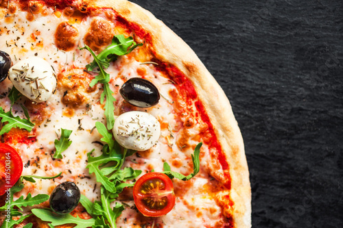 Hot Homemade Pepperoni Pizza Ready To Eat On Black Background Food Ingredients And Spices For Cooking Buy This Stock Photo And Explore Similar Images At Adobe Stock Adobe Stock