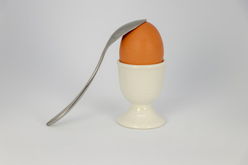 Boiled Egg in Egg Cup with Spoon