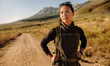 © Jacob Ammentorp Lund/Stocksy - Young asian woman with backpack on country walk