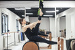 © Lumina/Stocksy - Woman Doing Pilates Exercise