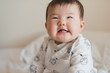 © Lauren Naefe/Stocksy - Baby making funny face