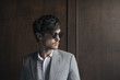 © Lumina/Stocksy - Portrait of Handsome Modern Businessman