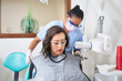 © Per Swantesson/Stocksy - Young woman being prepared for dental x-ray