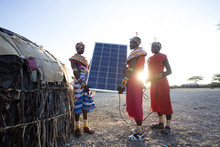 Samburu Women Holding Solar Panel In Kenya