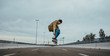 © Marko Milanovic/Stocksy - Young authentic urban adolescent/skateboarder on the streets doing tricks.