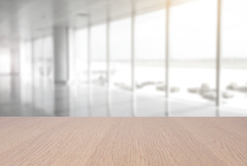 Wall Mural - top empty wood table on blurred abstract hallway background. can be used for display or montage your product.