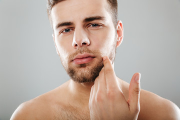 Wall Mural - Close up portrait of a handsome bearded man