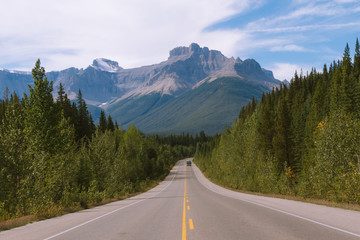 Scenic Icefields Parkway highway in Rocky Mountains, Alberta, Canada on sunny day