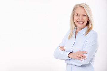 Wall Mural - portrait of a attractive business woman isolated. middle-aged woman face close-up