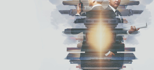 Double exposure of a businessman working and cityscape on whit background