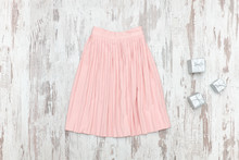 Pink Skirt And Silver Gift Boxes. Fashionable Concept