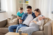 © Syda Productions - happy family with smartphone at home