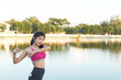 © reewungjunerr - Asian slim woman warm up before work out in a morning,slim girl exercise for life,selective focus,fill bright sunlight,Thailand people