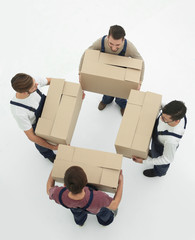 Delivery men with cardboard boxes on white background.