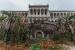 Beautiful facade of abandoned palace. Abandoned sanatorium in Gagra, Abkhazia