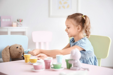 Canvas Print - Cute little girl playing at home