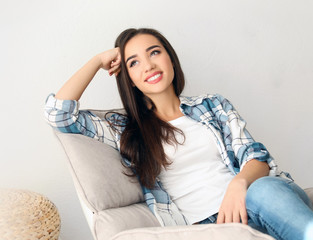 Wall Mural - Portrait of beautiful smiling woman at home