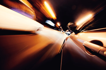 Car on the road with motion blur background.