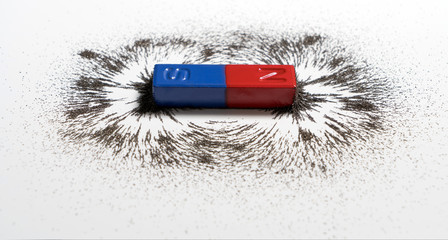 red and blue bar magnet or physics magnetic with iron powder magnetic field on white background. sci